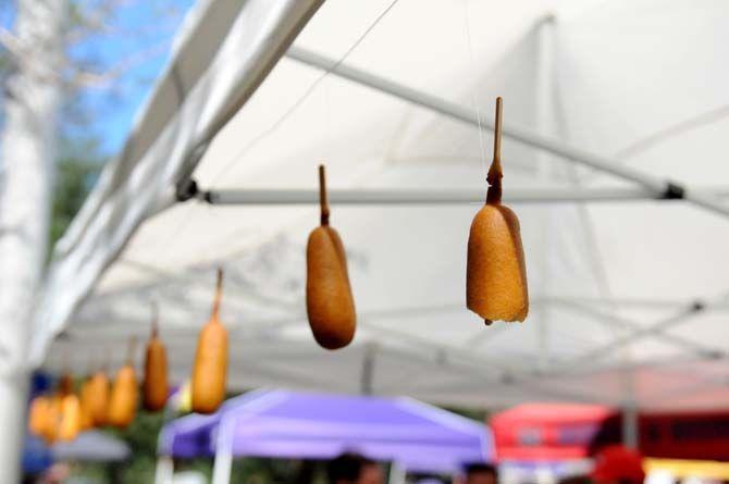 Handmade corndog garland line a tailgater's tent on the Parade Grounds Saturday, October 25, 2014.