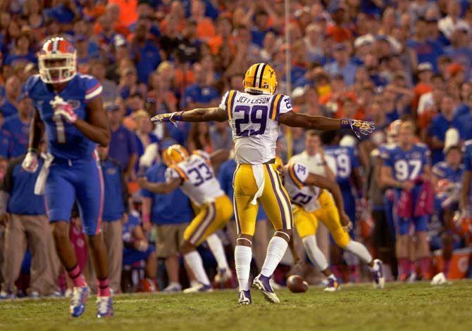 LSU sophomore saftey Rickey Jefferson (29) celebrates a defensive play Saturday, October 11, 2014 during the Tigers' 30-27 victory in Ben Hill Griffin Stadium.