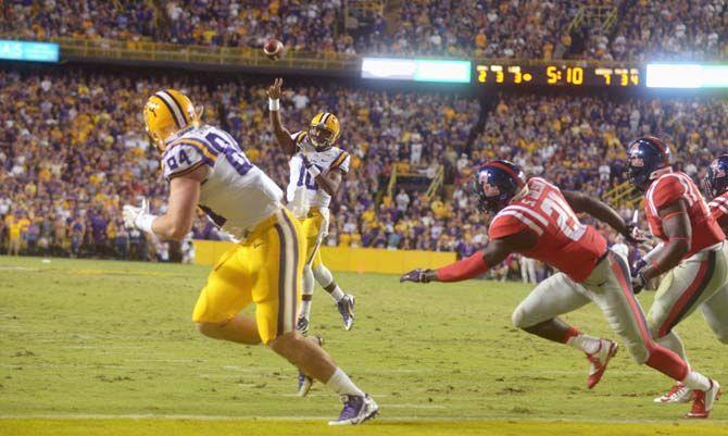 LSU sophomore Quarterback Anthony Jennings (10) passes the ball to senior tight end Logan Stokes (84) who scores a touchdown during Tigers' 10-7 victory against Ole Miss Saturday, October 25, 2014 in Tiger Stadium