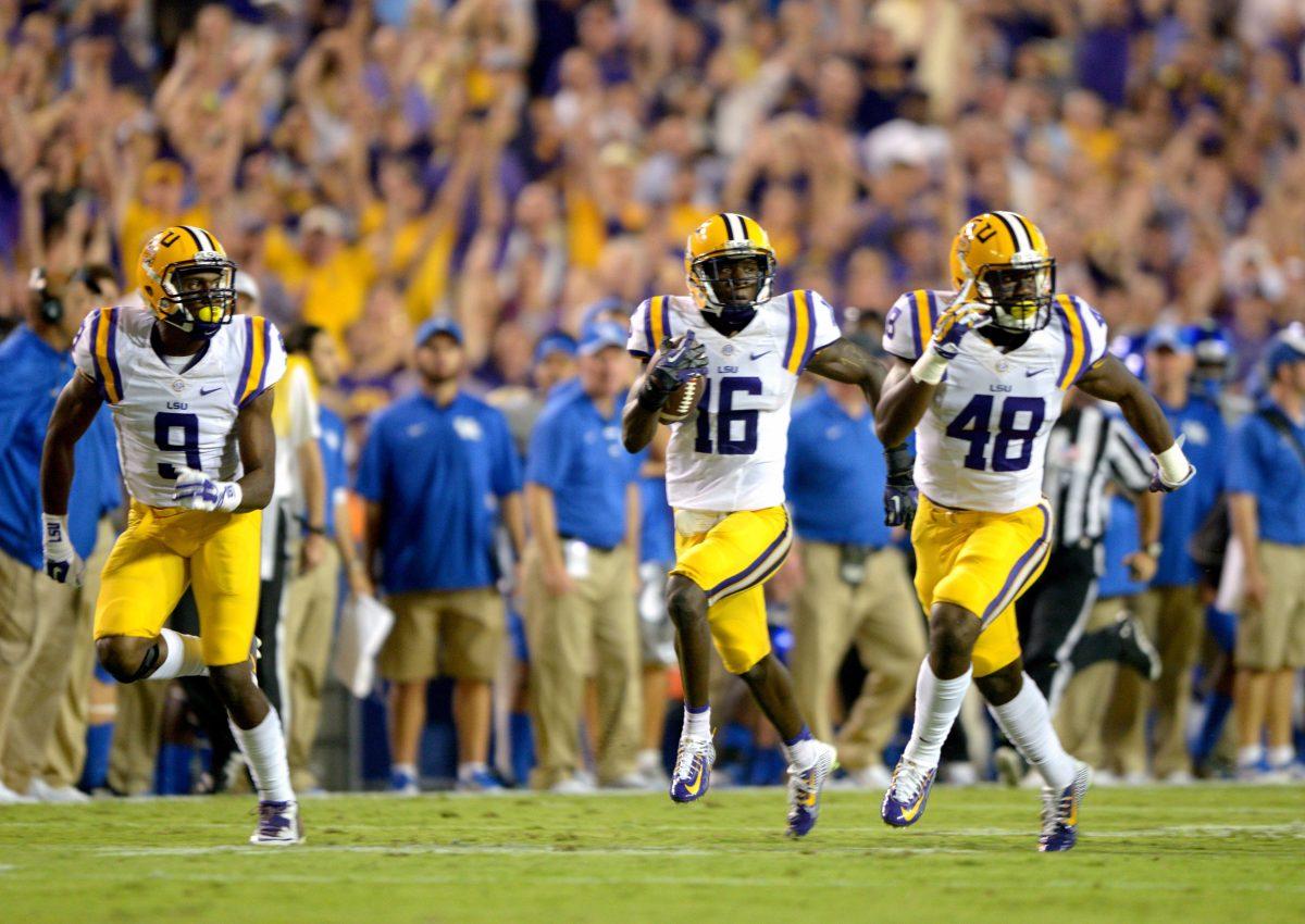 Defensive Back Tre'Davious White (16) returns a punt for a touchdown.