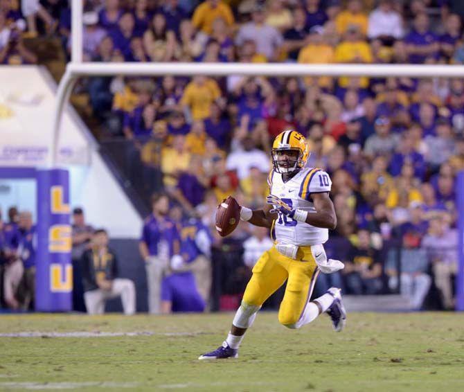 LSU sophomore Quarterback Anthony Jennings (10) runs the ball down the field in winning game against Ole Miss 10-7 Saturday, October 25, 2014.