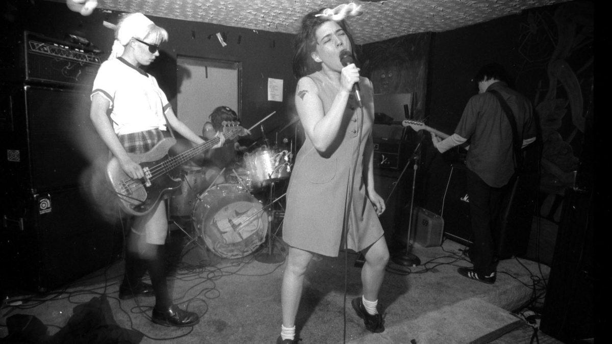 <p>Bikini Kill performs in Washington, D.C., in the 1990s.</p>