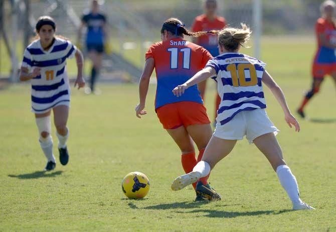 LSU sophomore midfielder, Emma Fletcher (10), attempts to steal the ball Sunday, Ocotber 26, 2014 where Tigers lost 3-0 against Florida Gators.