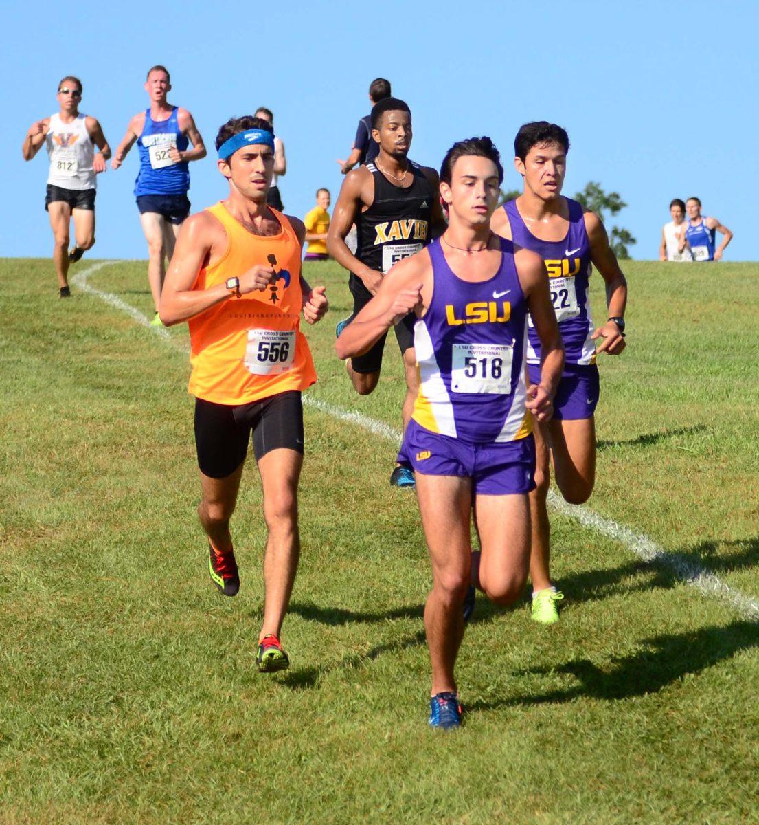 DC Lipani (516) and Daniel Taner (522) race in the LSU Cross Country Invitational at Highland Road Park on Saturday September 20, 2014.