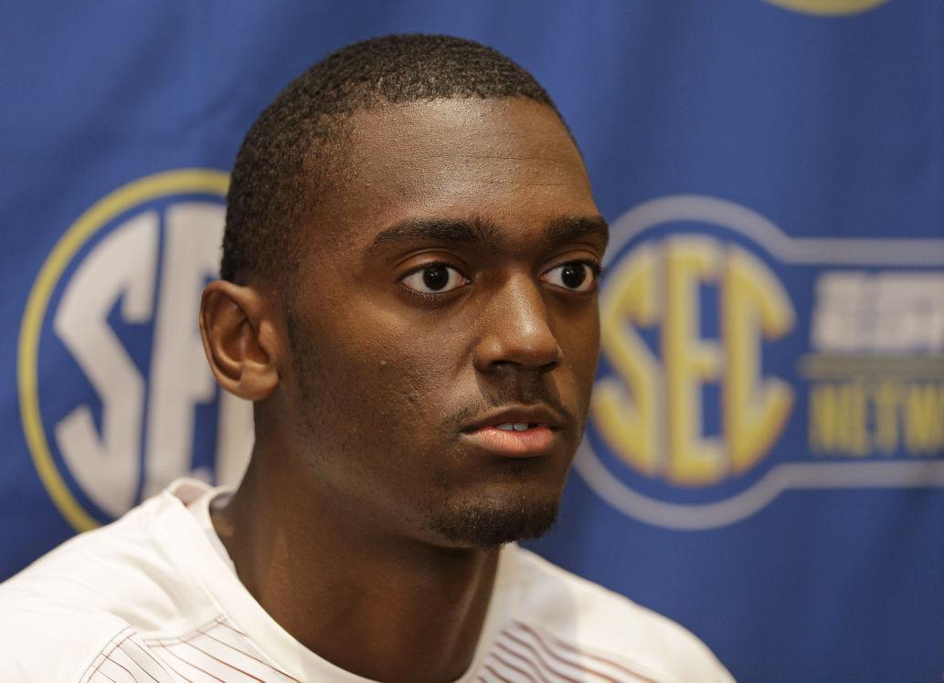 Arkansas' Bobby Portis answers a question during a news conference at the Southeastern Conference NCAA men's college basketball media day in Charlotte, N.C., Wednesday, Oct. 22, 2014. (AP Photo/Chuck Burton)