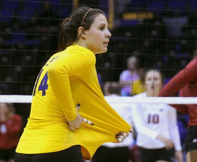 LSU senior setter Malorie Pardo (14) calls out a play during Tiger's 3-2 victory against Arkansas Sunday, October 5, 2014 in the PMAC.