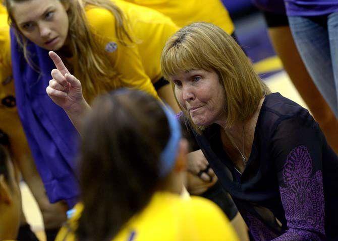 LSU Voleyball's head coach Fran Flory gives a pep talk to her team Wednesday in the PMAC where LSU won 3-0 against Mississippi State.