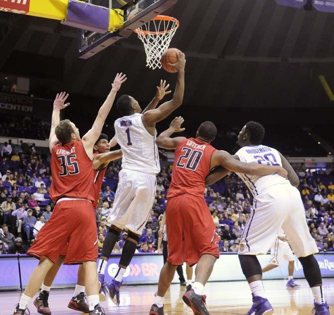 LSU sophomore forward Jarell Martin (1) lays up the ball during Tigers' 69-64 victory against Texas Tech Tuesday, Nov. 18, 2014 in the PMAC