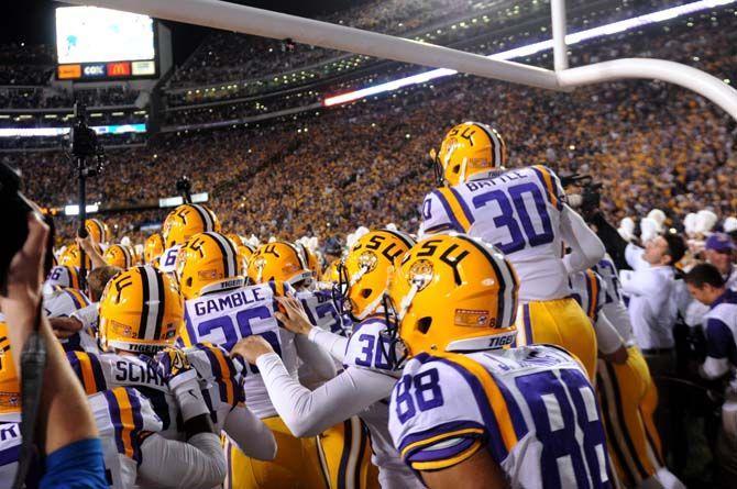 The LSU football team emerge on to the field from the locker room Saturday, November 8, 2014 during the Tigers' 20-13 loss against the Crimson Tide in Tiger Stadium.