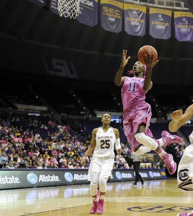 LSU freshman guard Raigyne Moncrief (11) jumps toward the basket Sunday, Feb. 16, 2014 during the Tigers' 57-73 loss to South Carolina in the PMAC.