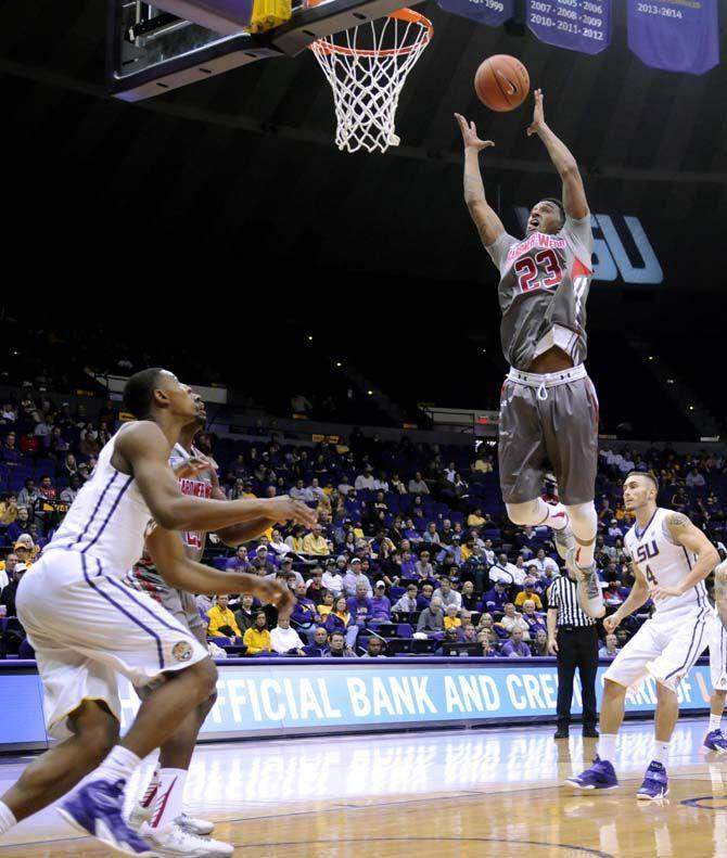 Gardner-Webb redshirt junior guard Adonis Burbage (23) jumps for a rebound during Tigers' 93-82 victory over Gardner-Webb on Saturday, Nov. 15, 2014 in the PMAC.