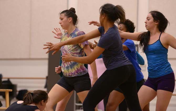 LSU sculpture senior Harlee Trautman leans forward while kinesiology sophomores Briana Yancy and Richmond McGough extend their arms towards her Tuesday, November 18, 2014 during a rehearsal for LSU Theatre&#8217;s upcoming Fall Dance Concert. The concert will be held in Reilly Theatre on November 22-23 and feature choreography by head of dance Sandra Parks.