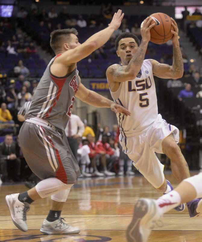 LSU junior guard Josh Gray (5) makes a layup during Tigers' 93-82 victory over Gardner-Webb on Saturday, Nov. 15, 2014 in the PMAC.