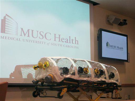 An isolation unit that would be used to transport an Ebola patient is displayed at the Medical University of South Carolina in Charleston, S.C., on Thursday, Oct. 16, 2014. During a news conference at the university, Catherine Templeton, the director of the South Carolina Department of Health and Environmental Control, discussed the state's preparations for dealing with Ebola cases. (AP Photo/Bruce Smith)