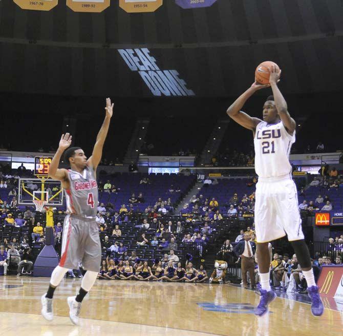 LSU freshman forward Aaron Epps (21) attempts a three-pointer during Tigers' 93-82 victory over Gardner-Webb on Saturday, Nov. 15, 2014 in the PMAC.