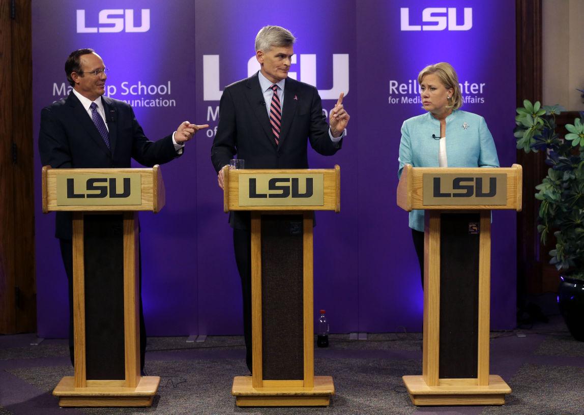 Sen. Mary Landrieu, D-La., right, Rep. Bill Cassidy, R-La., and Republican candidate and Tea Party favorite Rob Maness, left, participate in a Senate race debate on the LSU campus in Baton Rouge, La., Wednesday, Oct. 29, 2014. (AP Photo/Gerald Herbert)