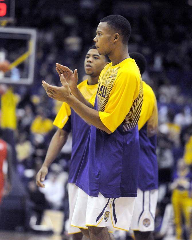 LSU senior guard, Antonio Robinson (13) cheers on his teammates during LSU's 69-64 defeat against Texas Tech on Monday, November 18, 2014.