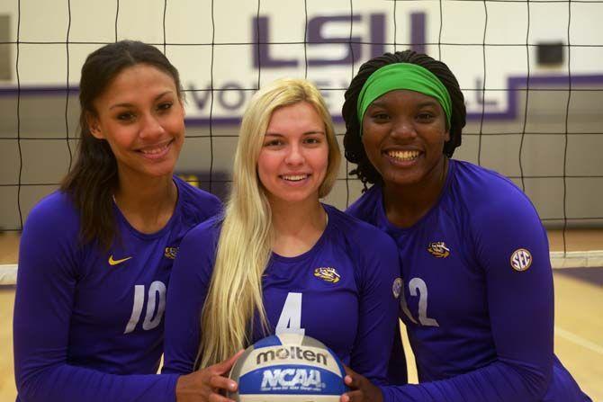 From left to right, LSU freshman outside hitter Mimi Eugene (10), freshman defensive specialist Kelly Quinn (4) and fresman outside hitter Gina Tills (12) played against eachother in Texas, before becoming teammates at LSU.