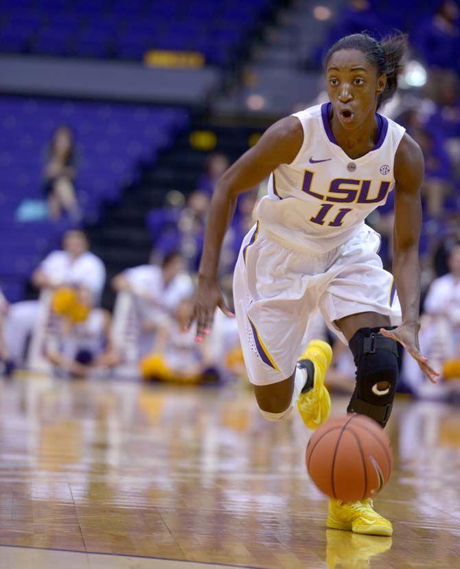 LSU women's basketball sophomore guard, Raigyne Moncrief (11), dribbles the ball during the game against Loyola in the PMAC where LSU won 93-71 on Wednesday, November 5, 2014.