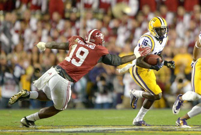 LSU sophomore defensive back Tre'Davious White (16) returns a punt Saturday, Nov. 8, 2014 during the Tigers' 20-13 loss against the Crimson Tide in Tiger Stadium.