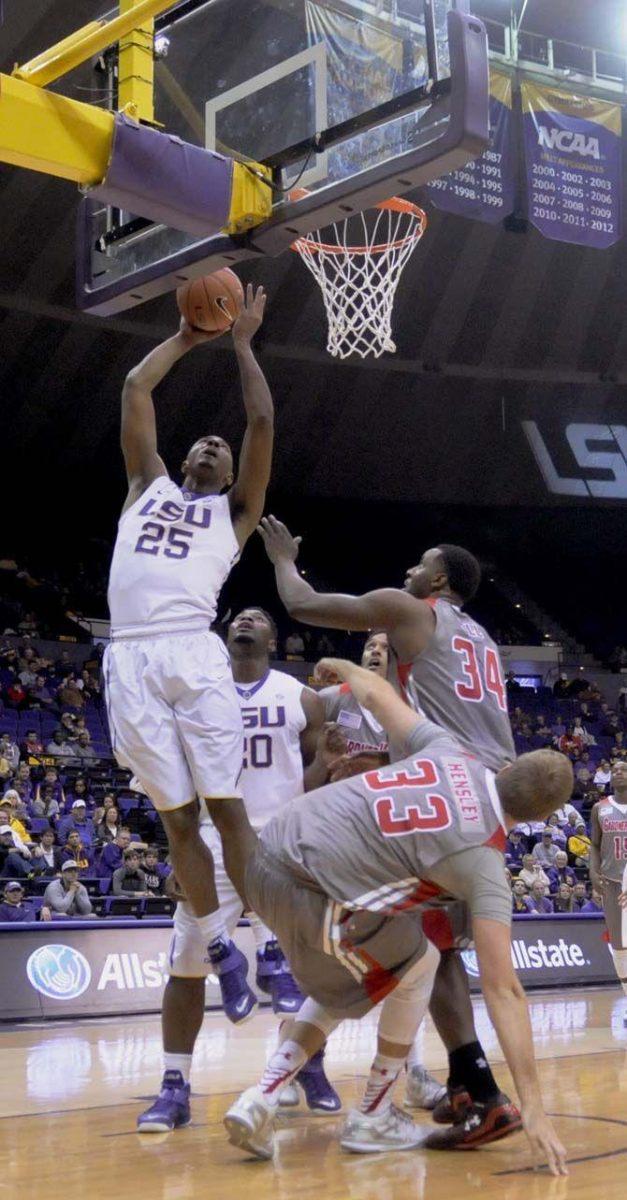 LSU sophomore forward Jordan Mickey (25)makes a layup during Tigers' 93-82 victory over Gardner-Webb on Saturday, Nov. 15, 2014 in the PMAC