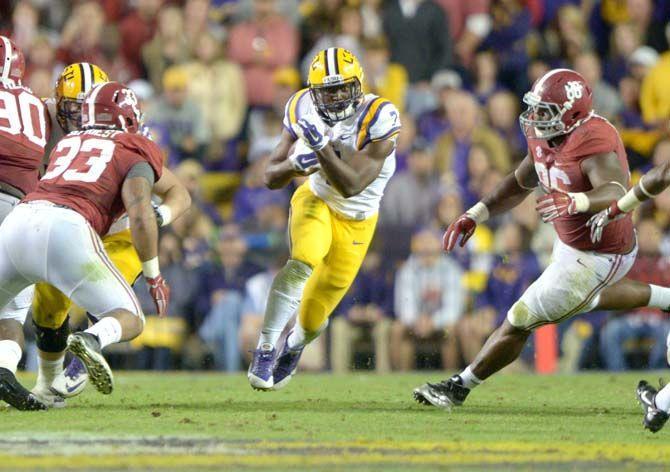 LSU freshman running back Leonard Fournette (7) makes his way downfield Saturday, Nov. 8, 2014 during the Tigers' 20-13 loss against the Crimson Tide in Tiger Stadium.