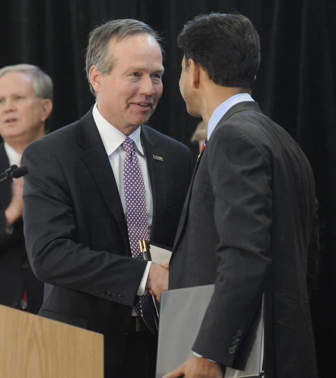 LSU President and Chancellor F. King Alexander joins leaders from the state's higher education systems to discuss funding for higher education in Baton Rouge Tuesday, January 21, 2014 at The E. J. Ourso College of Business