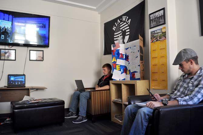 Student veterans relax, eat, and study at the Veterans Center in Hatcher Hall on Wednesday.