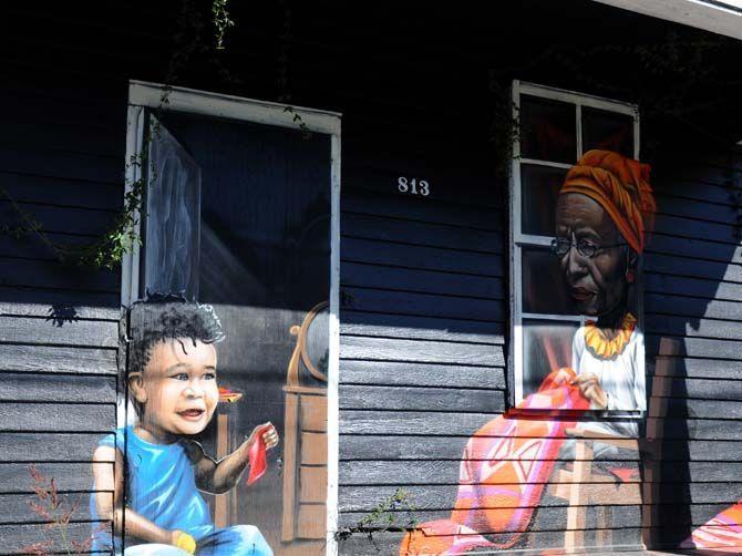 Murals from the Mural House project are found on the corner of Terrace and St Joseph. The project was started by Kevin Harris, director at the Museum of Public Art, as a way to replenish old buildings and art in the Baton Rouge community.