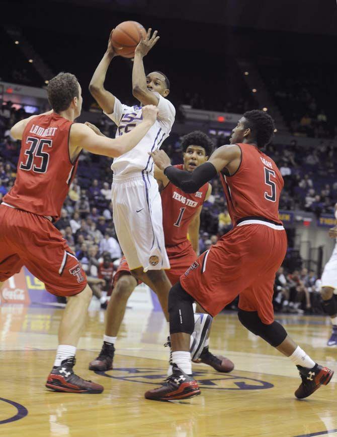 LSU sophomore guard Tim Quarterman (55) shoots the ball during the Tigers' 69-64 victory against Texas Tech Tuesday, Nov. 18, 2014 in the PMAC