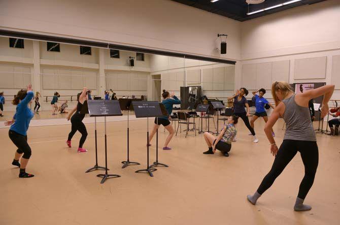 Members of a group routine practice together Tuesday, November 18, 2014 during a rehearsal for LSU Theatre&#8217;s upcoming Fall Dance Concert. The concert will be held in Reilly Theatre on November 22-23 and feature choreography by head of dance Sandra Parks.