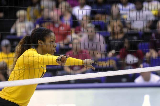 LSU sophomore middle blocker Briana Holman (13) looks at her oponents during Tiger's victory 3-2 against Arkansas Sunday, October 5, 2014 in the PMAC.