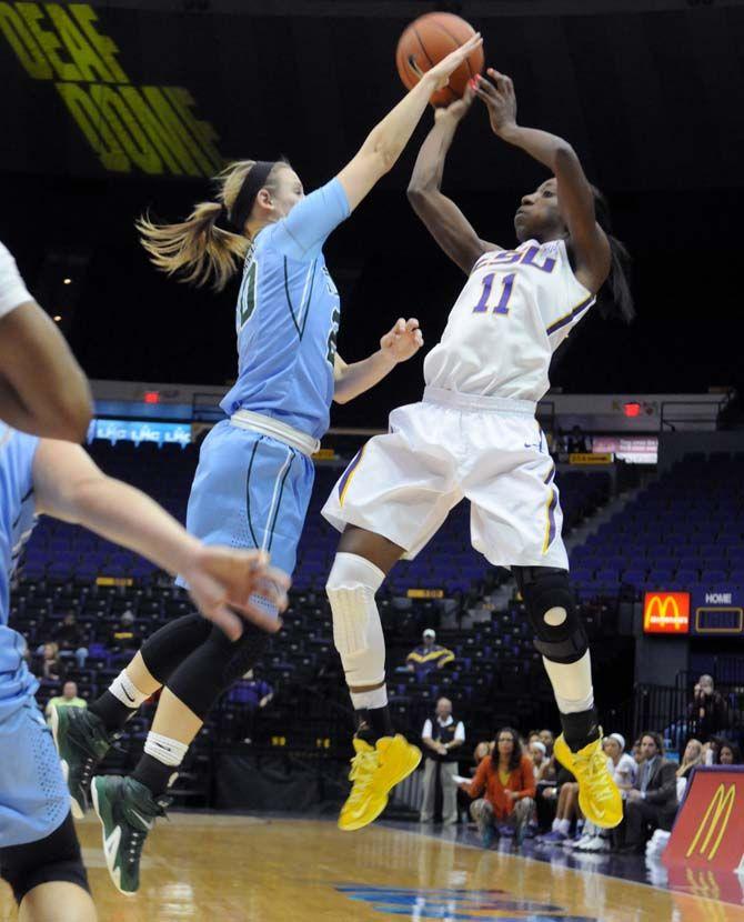 LSU sophomore guard Raigyne Moncrief (11) shoots the ball during the game Wednesday, November 19, 2014 where LSU lost 51-45 to Tulane in the PMAC.