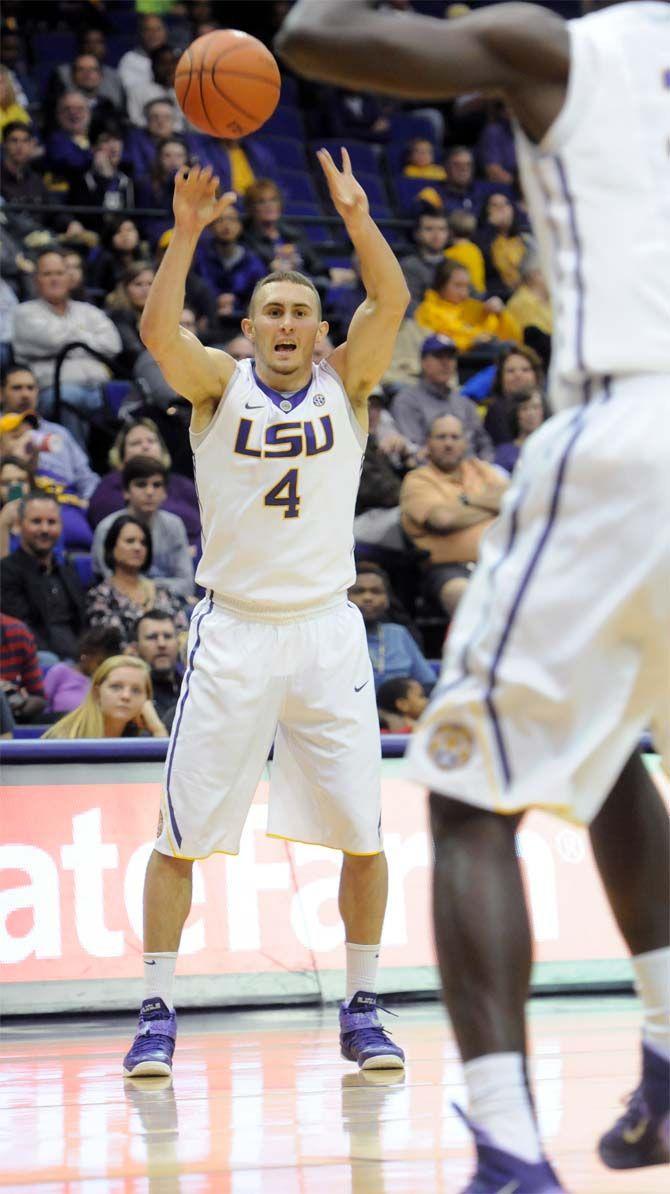 LSU junior guard, Keith Hornsby (4), passes the ball to senior forward, John Odo (31), in the PMAC where LSU defeated Morehouse State 71-47 in the exhibition game on Friday, November 7, 2014.