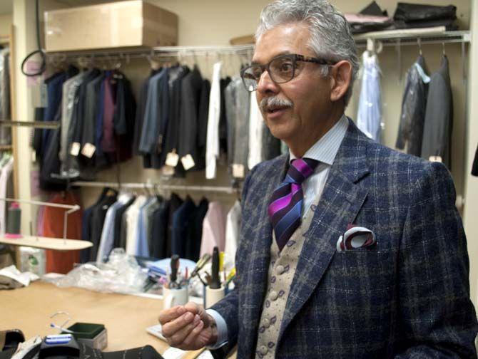 Custom Clothier Manuel Martinez speaks about the value of fine clothing at his shop on Monday.