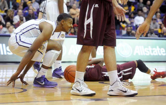 LSU sophomore forward, Jordan Mickey (25), gets up after colliding with a Morehouse player in the PMAC where LSU defeated Morehouse State 71-47 in the exhibition game on Friday, November 7, 2014.