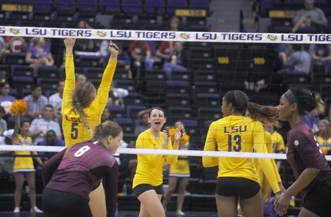 LSU freshman setter Elly Ogle (5) celebrates a set point during Tiger's victory 3-0 against Mississippi State Wednesday, October 8, 2014 in the PMAC.