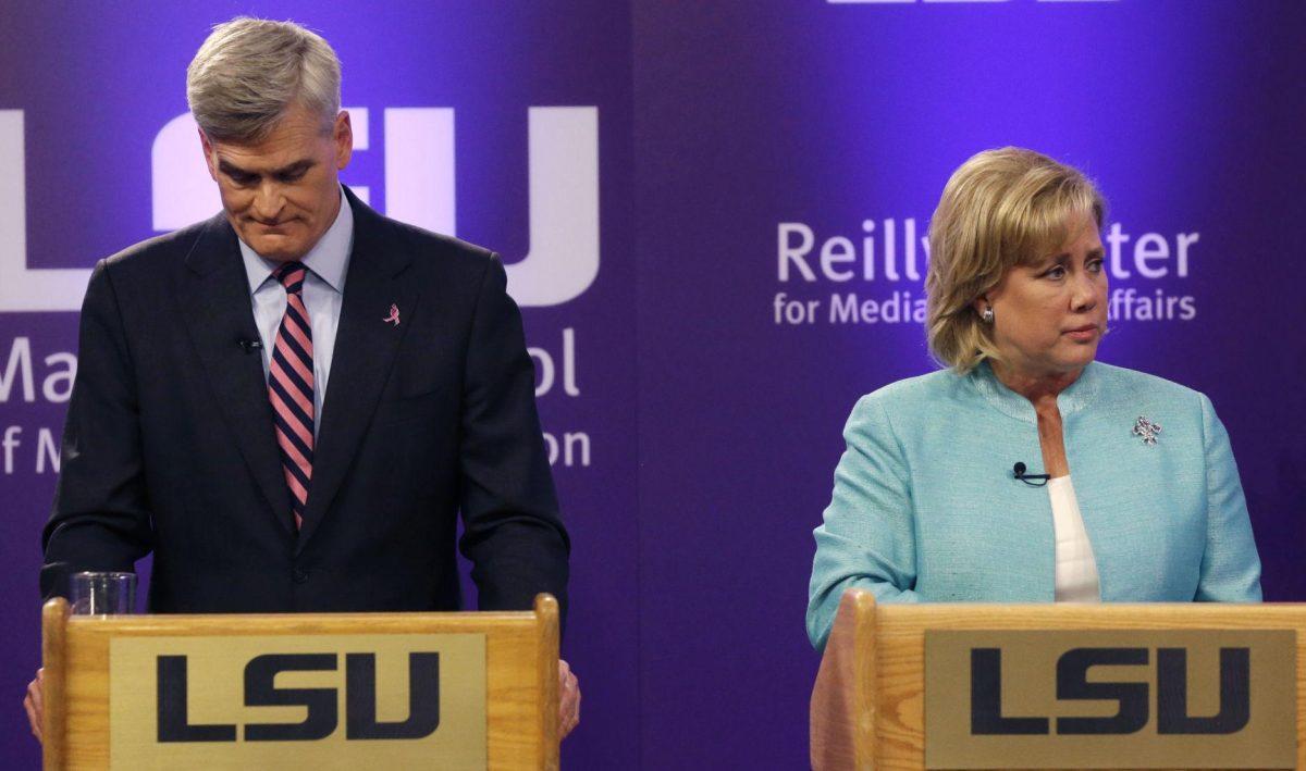 Sen. Mary Landrieu, D-La., right, and Rep. Bill Cassidy, R-La., left, participate in a Senate race debate with Republican candidate and Tea Party favorite Rob Maness on the LSU campus in Baton Rouge, La., Wednesday, Oct. 29, 2014. (AP Photo/Gerald Herbert)