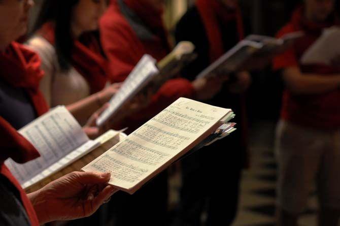 Christmas carolers gather for rehearsal Monday, Nov. 24 at Theatre Baton Rouge