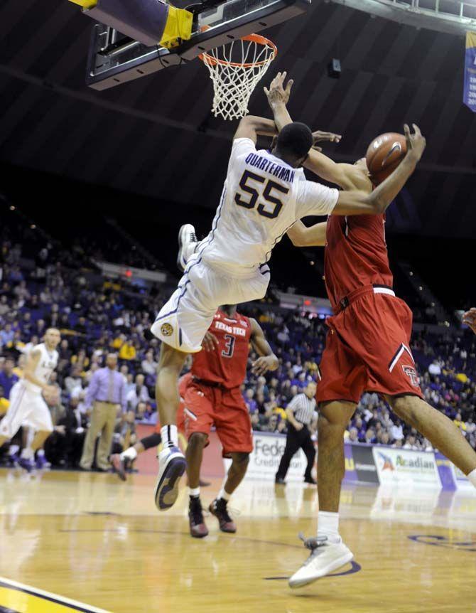 LSU sophomore guard Tim Quarterman (55) falls during the Tigers' 69-64 victory against Texas Tech Tuesday, Nov. 18, 2014 in the PMAC.