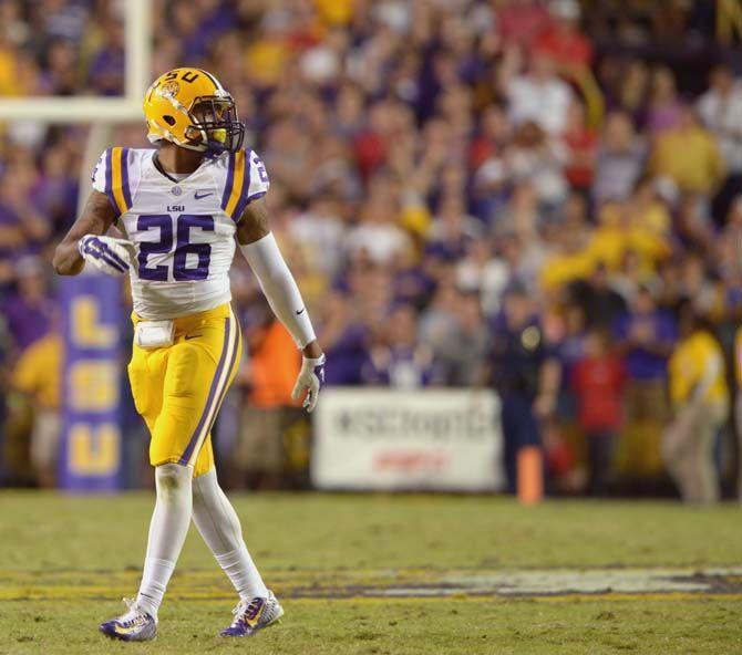 LSU senior safety Ronald Martin (26) walks towards the lineup during Tigers' 10-7 victory against Ole Miss Saturday, Oct. 25, 2014 in Tiger Stadium.