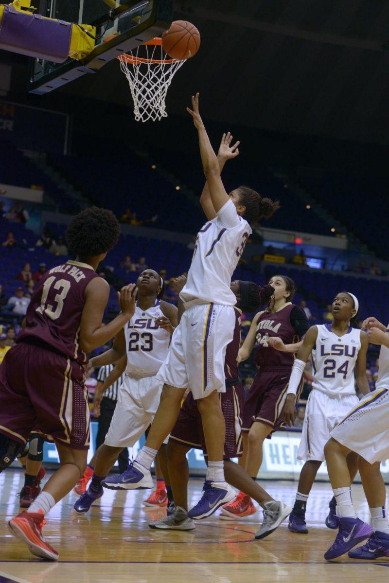 LSU freshman center/forward, Alliyah Fareo (35), scores a basket against Loyola in the PMAC on November 5, 2014, where LSU won 9