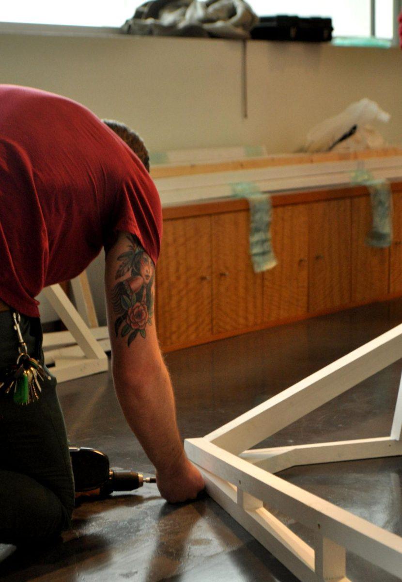 Local artist Silas Breaux works on his new installation, Dwelling, at the LSU Museum of Art on Wednesday.