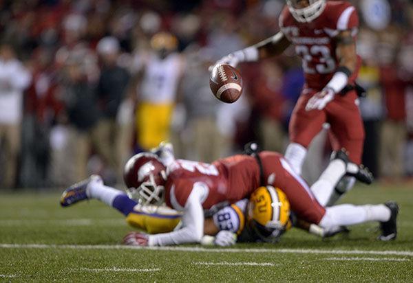 The ball is fumbled in losing game against Arkansas 17-0 Saturday, Nov. 15, 2014 in Donald W. Reynolds Razorback Stadium.