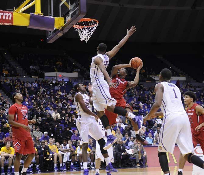 LSU sophomore forward Jordan Mickey (25) blocks a Texas Tech shot on goal during the Tigers' 69-64 victory against the Red Raiders Tuesday, Nov. 18, 2014 in the PMAC