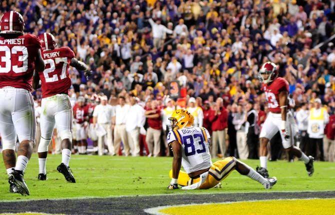 LSU sophomore wide receiver Travin Dural (83) gets up off the ground after an incomplete pass during the Tigers' 20-13 loss against the Crimson Tide in Tiger Stadium.