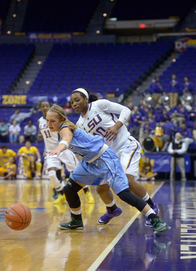 LSU sophomore guard Jasmine Rhodes (10) attempts to steal the ball during the game Wednesday, November 19, 2014 where LSU lost 51-45 to Tulane in the PMAC.