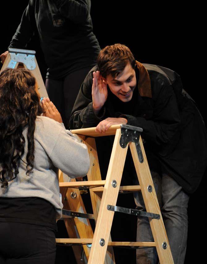 LSU students Janae' London and Hal Lambert perform in new Hopkins Black Box production "On a Snowy Evening." The play is holiday themed and introduces storytelling, music, and puppets into the show.