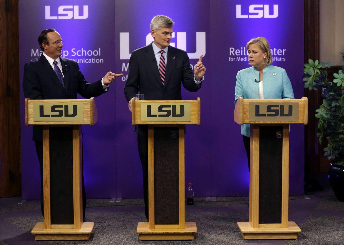 Sen. Mary Landrieu, D-La., right, Rep. Bill Cassidy, R-La., and Republican candidate and Tea Party favorite Rob Maness, left, participate in a Senate race debate on the LSU campus in Baton Rouge, La., Wednesday, Oct. 29, 2014. (AP Photo/Gerald Herbert)