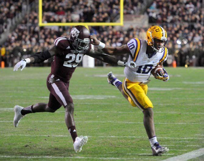 LSU sophomore quarterback, Anthony Jennings (10), runs the ball in Kyle Field, College Station where Tigers had a 23-27 victory against Texas A&amp;M on November 27.